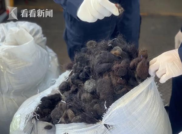 “洋垃圾”退！退！退！海关查获废弃人体头发4864公斤-2.jpg